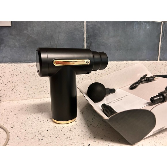 Small massage, gun, small, but mighty works as well as the big bulky handheld - Picture 5 of 11